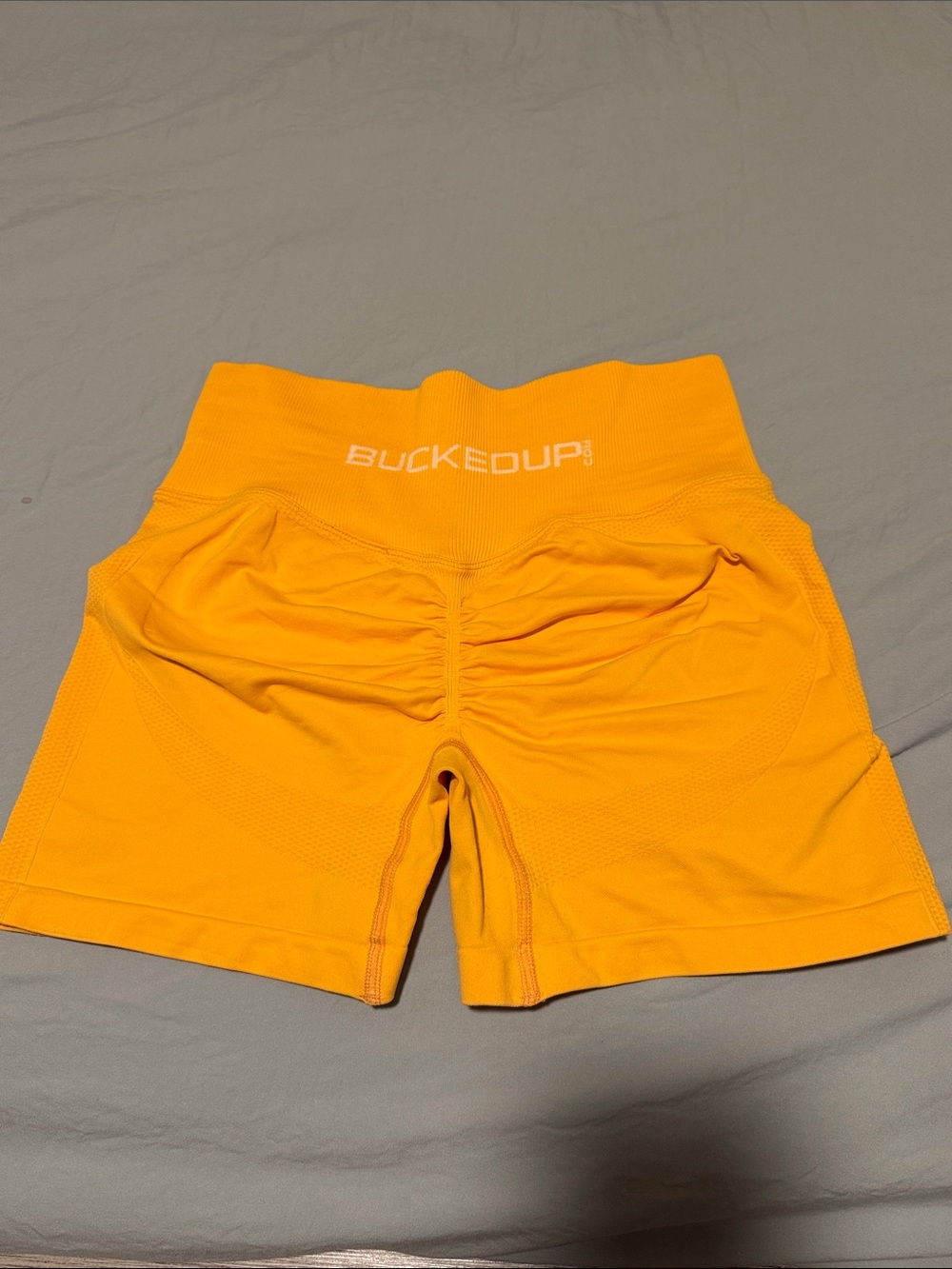 BUCKEDUP® High-Waist Scrunch Bike Shorts in Bright Orange